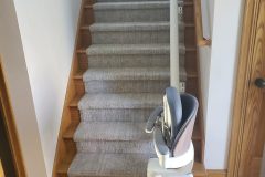 Flow X curved stair lift installed on a curved staircase