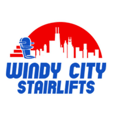 Logo for Windy City Stairlifts featuring a wheelchair lift, a red Chicago skyline, and bold blue text reading Windy City Stairlifts beneath the graphic.