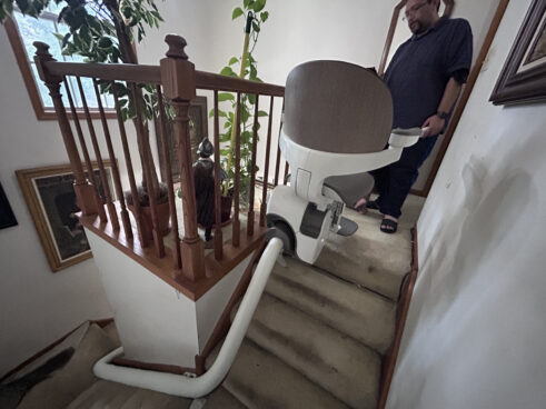 Flow X curved stairlift install in Algonquin, Illinois on a curved staircase.